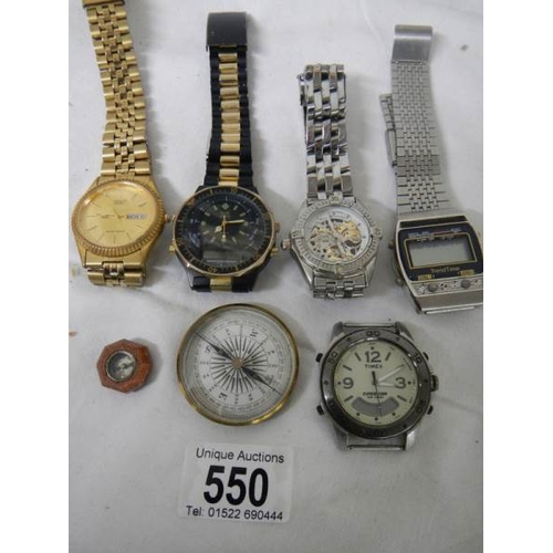 550 - A quantity of old wrist watches and 2 compasses.