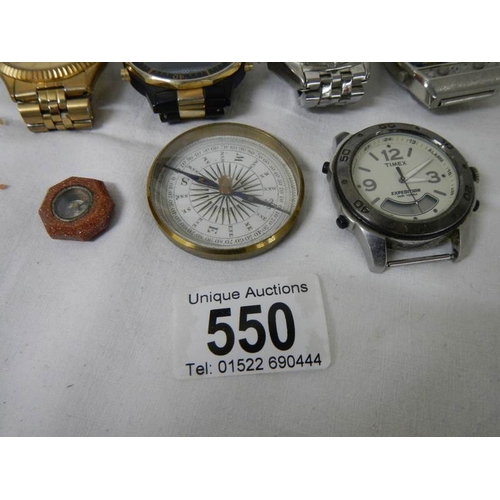 550 - A quantity of old wrist watches and 2 compasses.