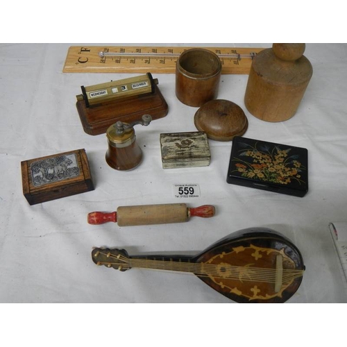 559 - A mixed lot including match holder, perpetual calendar, thermometer, etc.,