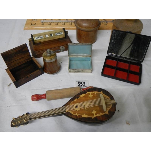 559 - A mixed lot including match holder, perpetual calendar, thermometer, etc.,