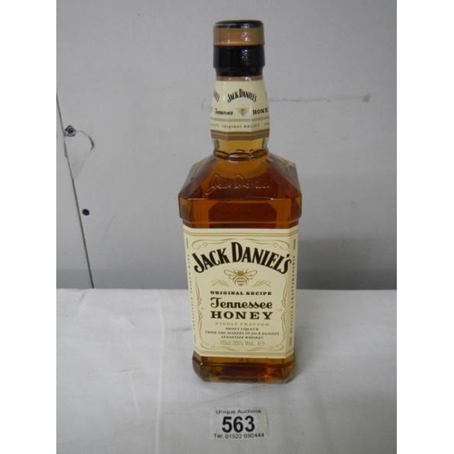 563 - A bottle of Jack Daniels Tennessee Honey Whiskey.