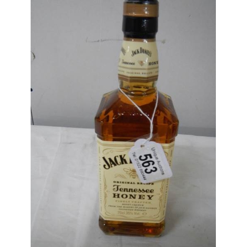 563 - A bottle of Jack Daniels Tennessee Honey Whiskey.