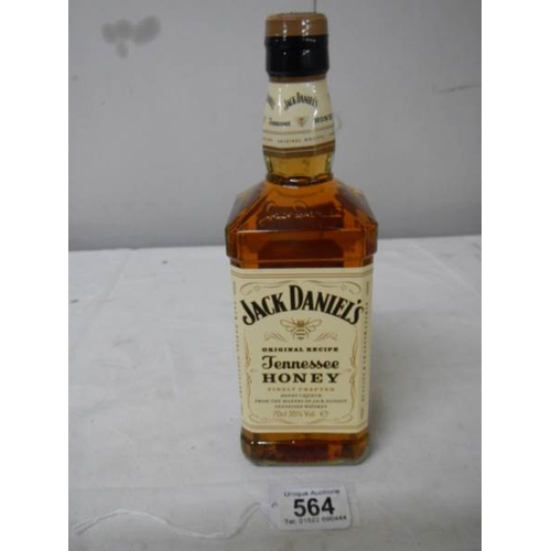 564 - A bottle of Jack Daniels Tennessee Honey Whiskey.