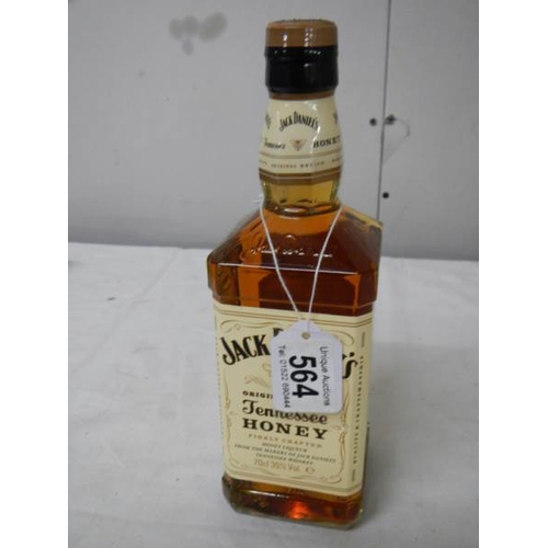 564 - A bottle of Jack Daniels Tennessee Honey Whiskey.