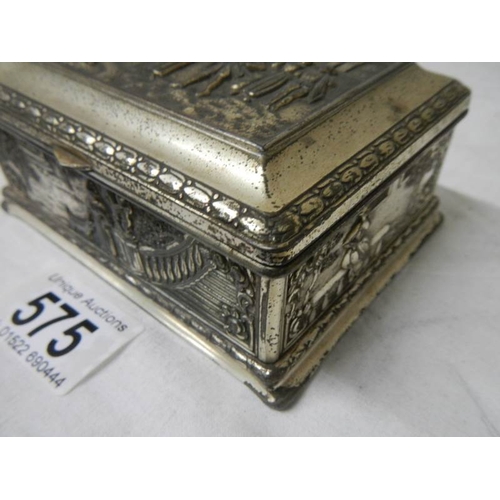 575 - An embossed silver plated box decorated with Elizabethan dancers in a court yard, plate worn.  11 x ... 