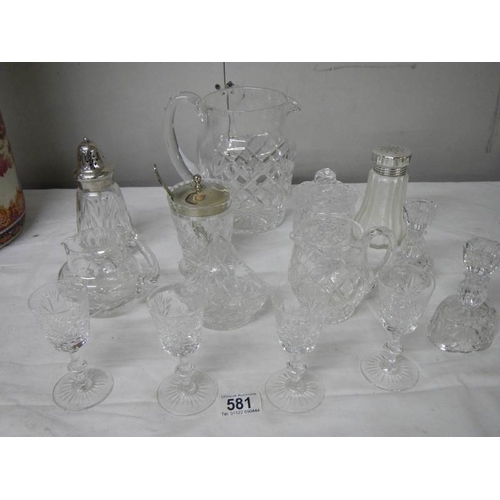 581 - A good lot of but glass including candlesticks, sugar sifters, jam pots, jugs etc., (14 items).