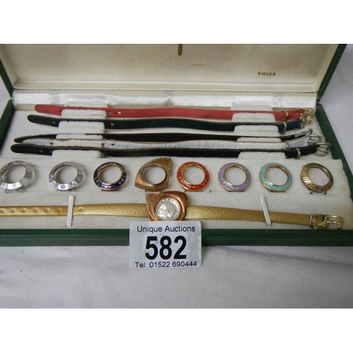 582 - A boxed vintage Titoni Coloursdope 9 ladies wrist watch with 9 interchangable head covers (missing 3... 