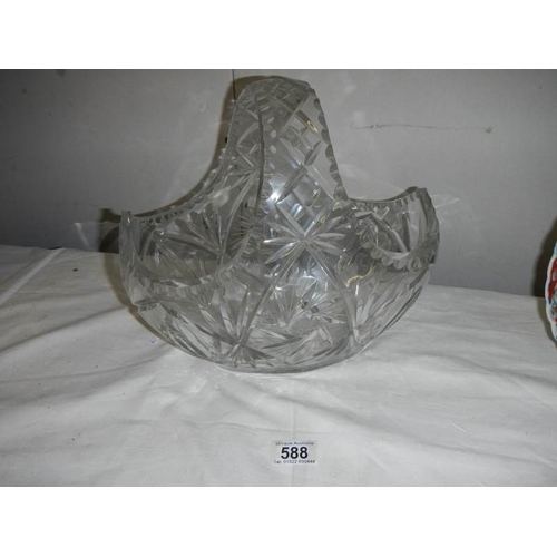 588 - A large cut glass basket, 30cm wide x 27cm tall.