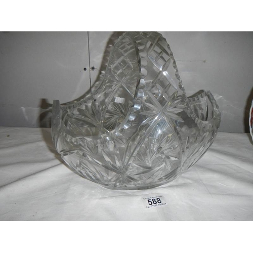 588 - A large cut glass basket, 30cm wide x 27cm tall.