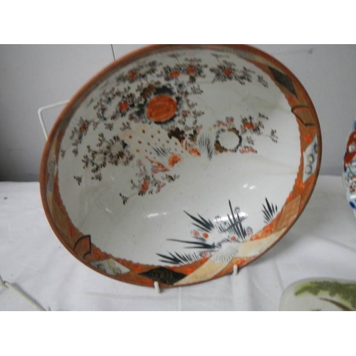 589 - An old Chinese bowl, Chinese plate and Chinese scent bottle.