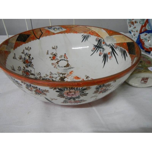 589 - An old Chinese bowl, Chinese plate and Chinese scent bottle.