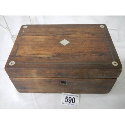 590 - A rosewood tea caddy (crack to one lid).