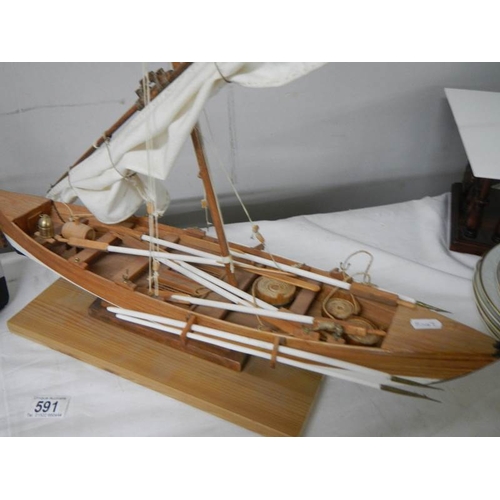 591 - 2 good model sailing boats, small 33 cm long, large 62 cm long.