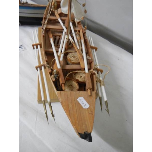 591 - 2 good model sailing boats, small 33 cm long, large 62 cm long.