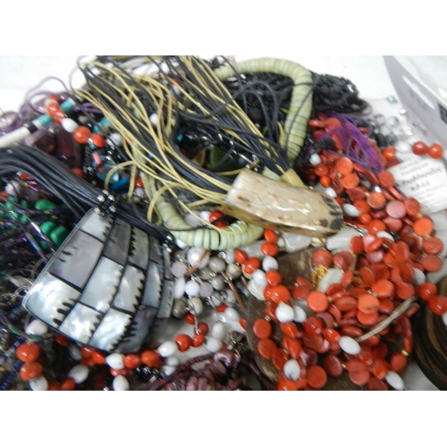 593 - A mixed lot of unsorted costume jewellery.