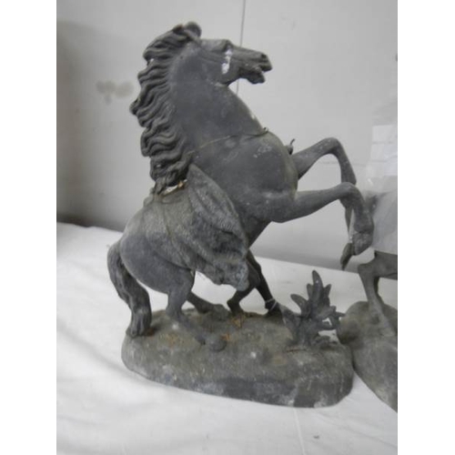 595 - 2 spelter horse figures a/f. damage to one horse leg and part of leg missing, 45 cm tall.