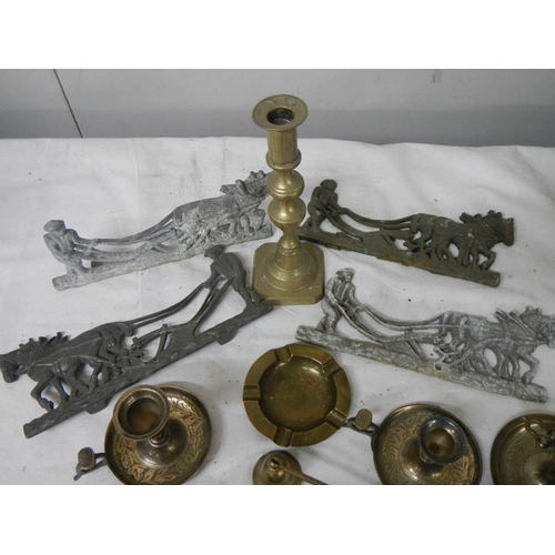 598 - An interesting lot of brass and other metal items.