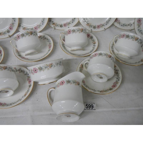 599 - 20 pieces of Paragon tea ware, no damage.