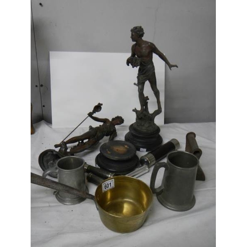 601 - A mixed lot of brass and spelter items and old torches (one figure a/f).