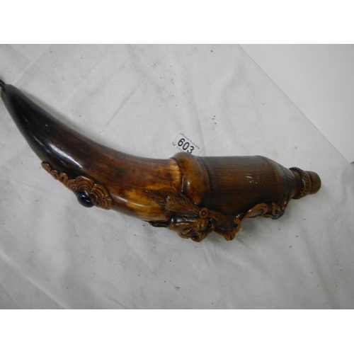 603 - An unusual horn shaped (possibly spirit) container with glass insert and screw stopper in good condi... 