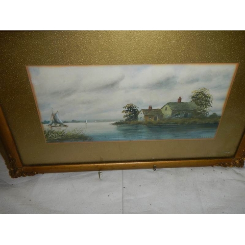 606 - A pair of framed and glazed rural scene watercolours signed  S Russell.