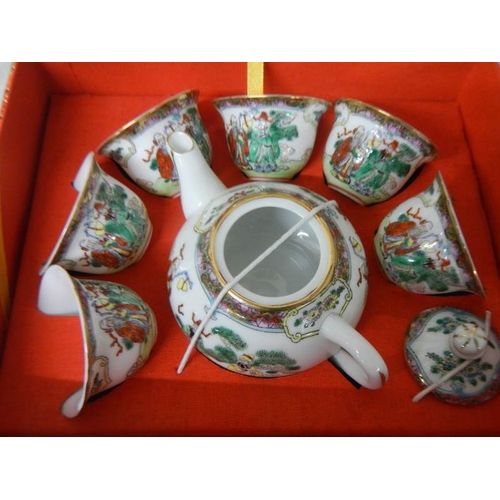 623 - A boxed Japanese tea set.