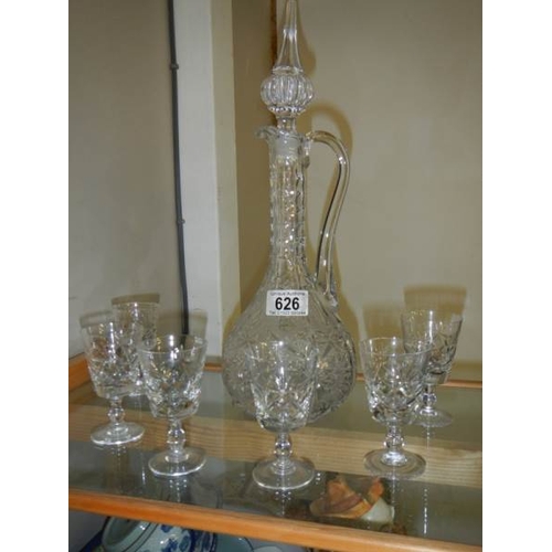 626 - A glass claret jug and set of 6 glasses.