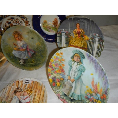 628 - 8 collector's plates including Wedgwood.