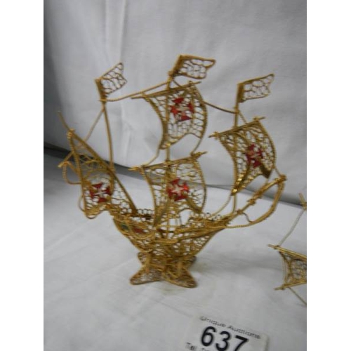 637 - A gold coloured wire model of a sailing ship and a windmill.