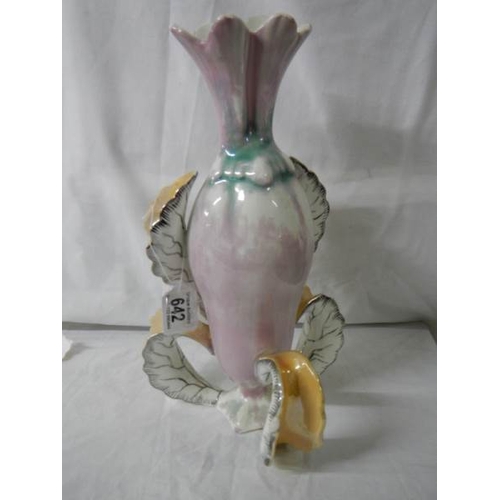 642 - An unusual mid 20th century scrolly leg vase, in good condition, 35 cm tall.