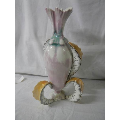 642 - An unusual mid 20th century scrolly leg vase, in good condition, 35 cm tall.