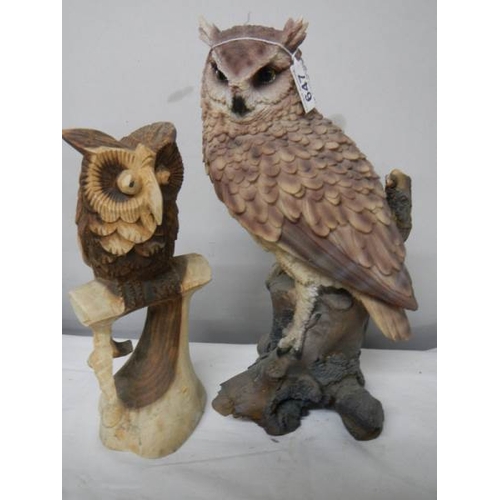 647 - A tall long eared owl (36 cm) and a smaller carved owl.