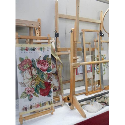 657 - A selection of tapestry frames, embroideries etc.,