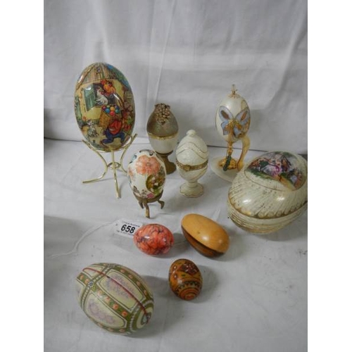 658 - A mixed lot of decorative collector's eggs in china and other materials.