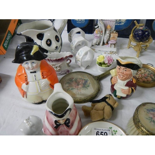 659 - A mixed lot of collectable ceramics etc., napkin rings, Poole, miniature world globe etc.,