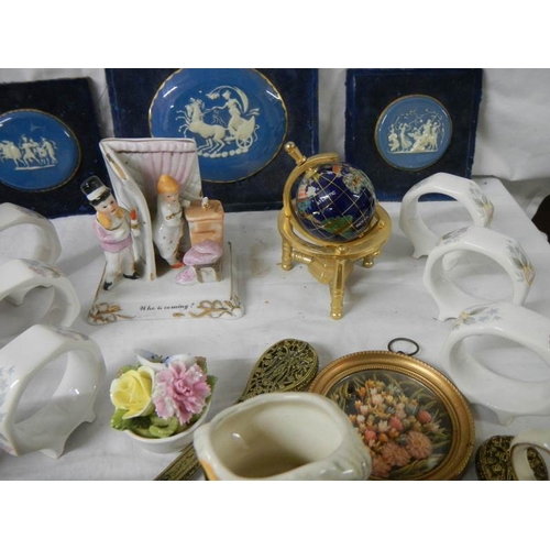 659 - A mixed lot of collectable ceramics etc., napkin rings, Poole, miniature world globe etc.,