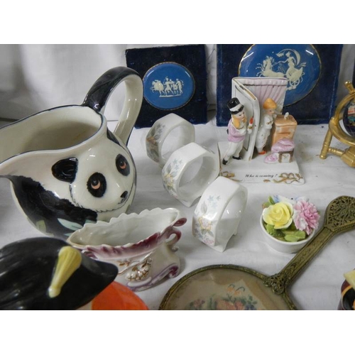 659 - A mixed lot of collectable ceramics etc., napkin rings, Poole, miniature world globe etc.,