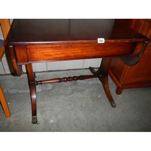 664 - A mahogany drop side sofa table.