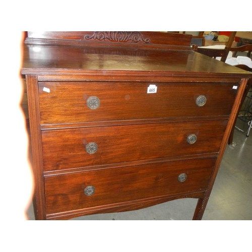 665 - A mahogany 3 drawer chest.