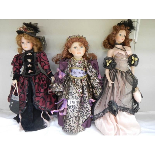 675 - 3 good collector's porcelain dolls.