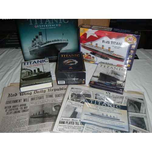 676 - A mixed lot of Titanic items, jigsaw puzzle, newspapers, book etc.,