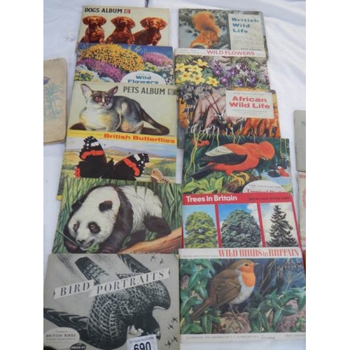 690 - 19 books of tea cards (2 incomplete).