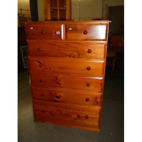 697 - A tall 5 drawer pine chest in very good condition.