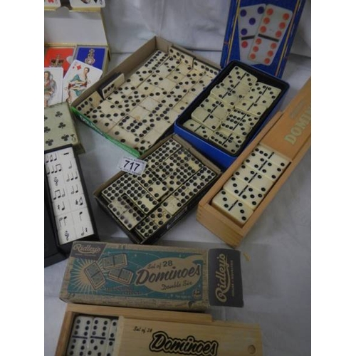 717 - 6 sets of dominoes and 2 sets of playing cards.