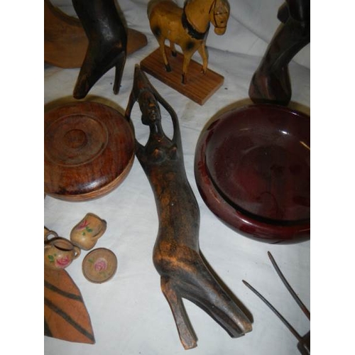 732 - A mixed lot of wooden items including ethnic.