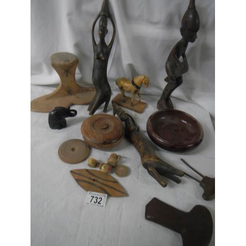 732 - A mixed lot of wooden items including ethnic.