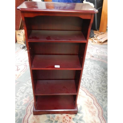 783 - A slim mahogany book case.