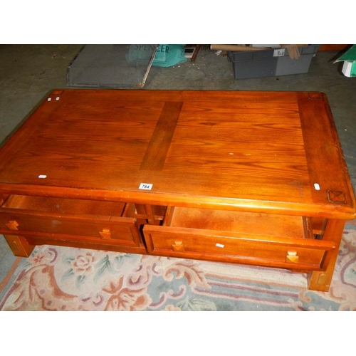 784 - A low 2 drawer coffee table.