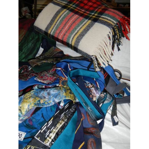 790 - A mixed lot of silk/cotton ties including 'Batman', a silk throw and a wool rug.