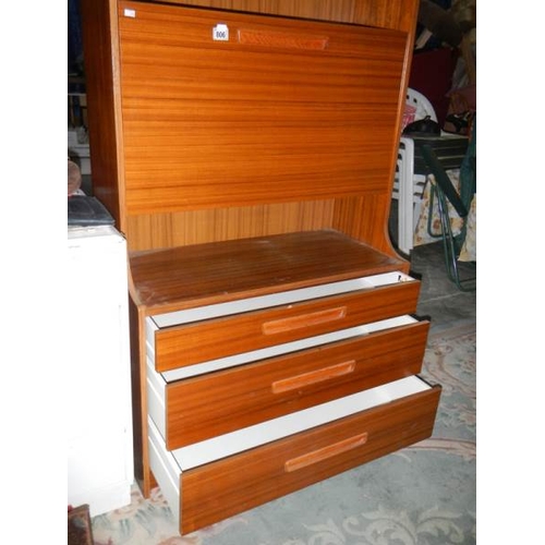 806 - A retro style wall unit with 3 drawers, 2 shelves and drop down front.